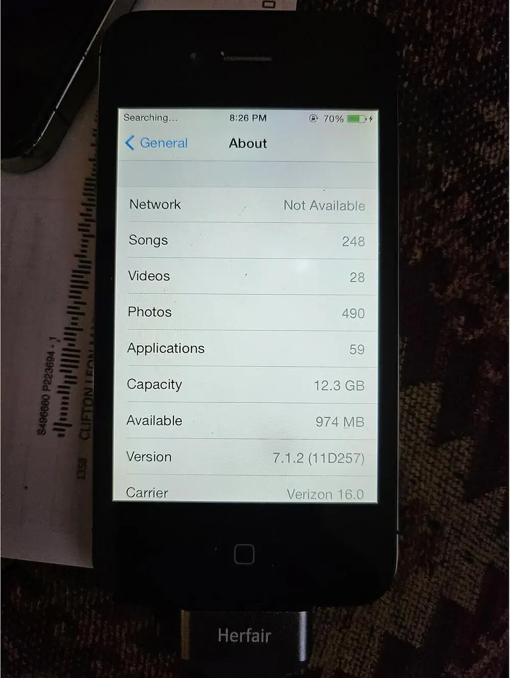 Apple iPhone 4 (i think) - black- charges and powers on. Working. Excellent